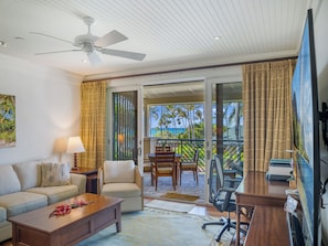 Ocean & beach view living room! - with pull-out gel memory foam sofa bed and 75" SMART TV, DVD player and ceiling fan.