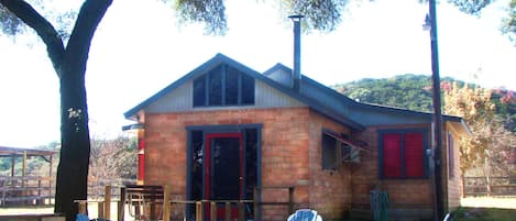 Large Oak trees keep the Cabin shaded.