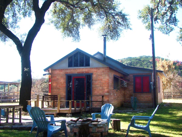 Large Oak trees keep the Cabin shaded.