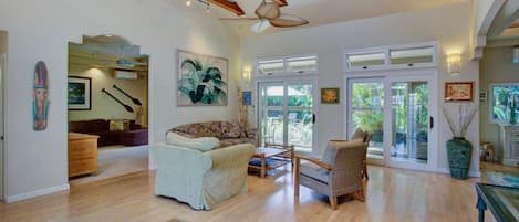 High beam ceilings - natural light. Opens to media room and lanai/backyard.