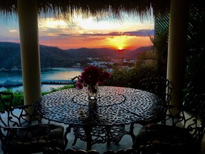 View from the terrace of the Santa Cruz bay and marina at sunset