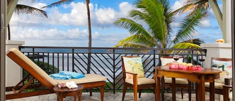 Ocean and beach view lanai! - Watch the whales breach from your lanai with dining table, chaise lounge and end table!