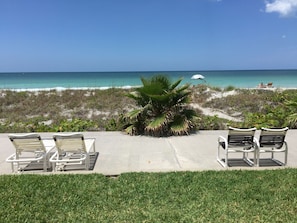 Step out the door to this amazing water view and right on the beach.