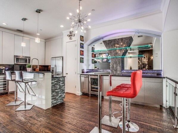 Beautiful Kitchen with everything you need to cook up a great meal. Ice maker, wine cooler, coffee maker and more. 