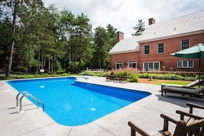 Large in-ground pool offers complete privacy for you and your houseguests!
