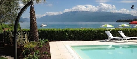 View of the lake and the swimming pool