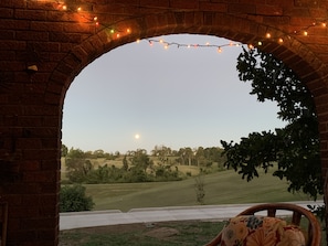 Watch the moon rise over the golf course from the full size sofa