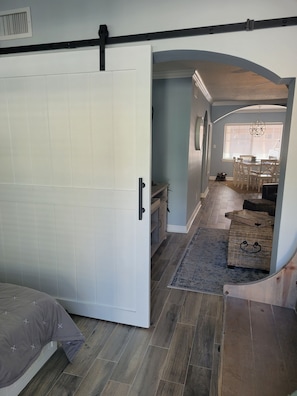 QUENN SIZE BED IN 2 ND ROOM WITH CHIC BARN DOOR ENTRANCE