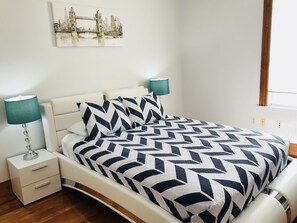 Spacious bedroom has a closet and 45’ Plazma TV