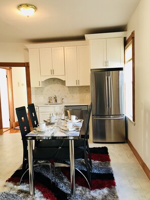 Beautiful gourmet chef’s kitchen to cook or relax for champagne brunch or coffee