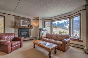 Expansive view of the Studio from vantage point of the kitchen. Sky Chutes view.