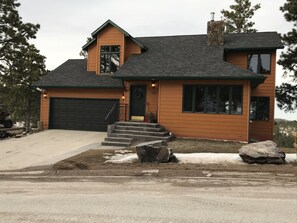 Front view of the house and garage