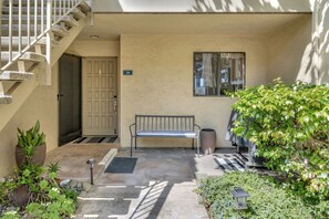Front door and patio area.
 Easy entrance no stairs. but 2nd floor view. Gas BBQ