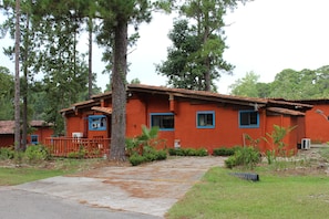 The main entrance, deck with picnic table and BBQ grill, 3 driveways