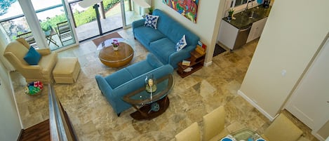 Colors of the surf, sand and sea fill the bright main living space