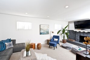 Living room with 60" tv and fireplace!