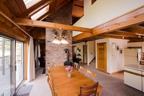 Dining Room with table for 8, living room around fire place.