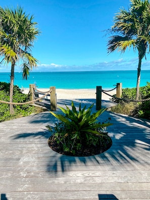 End of boardwalk with steps down to the beach