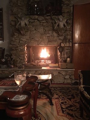 Romantic stone fireplace in the living room 