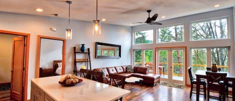 Large island in kitchen with matching quartz countertops 