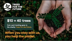 Stay with us: Each booking plants 40 trees with 'Trees For The Future,' creating a greener tomorrow!
