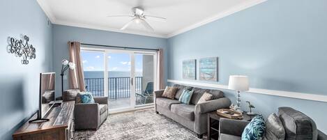 Comfortable living room with direct beach views!
