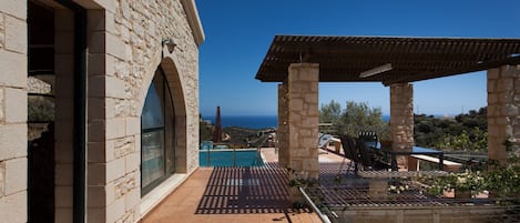 the front of the house with view of the sea