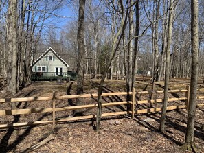 Fully fenced back yard.  Wire mesh stabled to rails from ground to top rail. 