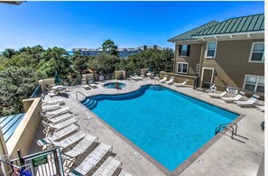 Convenience... Pool and spa steps from condo with stunning ocean-view backdrop