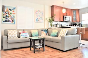 Urban genuine leather sectional sofa with sleeper for common area in open space 