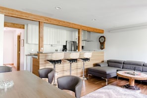 Living area looking into Kitchen