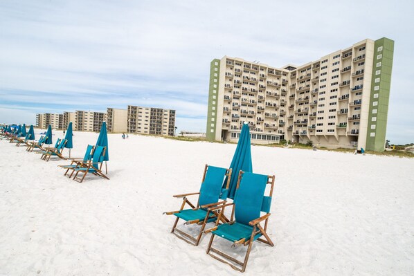 VIEW FROM THE BEACH TO THE TOWER, SHOWING THE MID RISE CONDOS