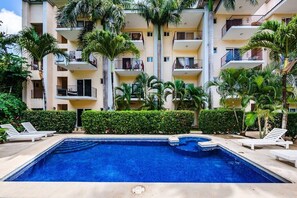 Jump in for a refreshing splash surrounded by tropical plants