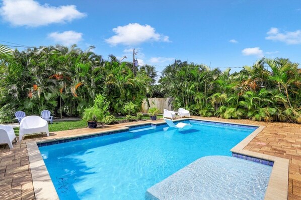 Pristine South facing heated pool