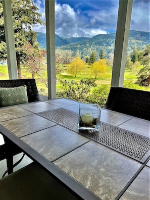 Outdoor dining overlooking the foothills and golf course.