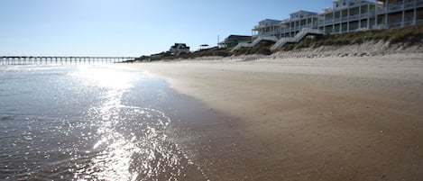 View of the home from the beach in front of home