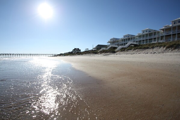 View of the home from the beach in front of home