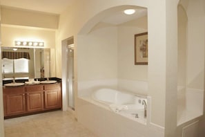 Master bedroom ensuite bathroom with separate shower, double sink and jacuzzi