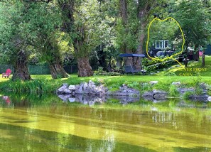 RIVER FRONT HOME - Photo was taken from across the Little Spokane River.
