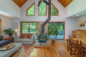 Lots of windows, a vaulted ceiling, and a cozy wood stove.