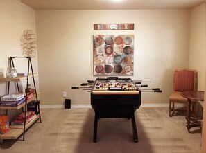 Game rooms with foosball, game table and tons of games