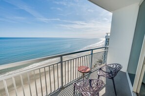 - Stunning panoramic ocean views stretch for miles from this balcony escape - Relax with a morning coffee or an evening drink while listening to the waves roll in - Perfect spot to unwind, soak up the sun, and take in the breathtaking beachfront scenery