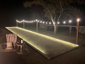 Lighted bocce ball court.