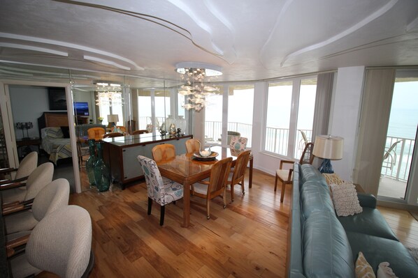 Your dining table seats eight, kitchen bar counter seats four.
