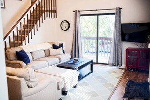 Living room with view of patio