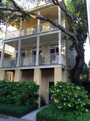 Porches overlook croquet lawn, rocking chairs on both levels