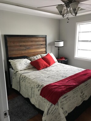 Queen bed in bedroom