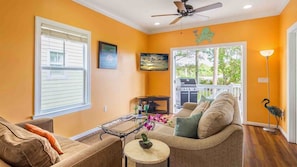 The living area has two large couches (including a queen sofa bed)...