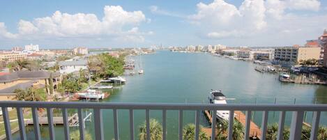 Enjoy a Cocktail while watching the Dolphins and Gorgeous Sunset on this lovely Bay Front Balcony