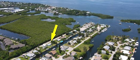 The view down the Gulf access canal at Tarpon Camp is picture perfect & just 3 minutes to the open water. Picture yourself there!